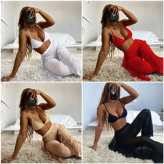 A woman models a three-piece bikini set featuring a triangle top and matching sheer frill trousers.
