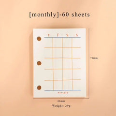 A small, rectangular monthly planner refill page with three binder holes and a grid layout.