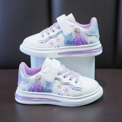 A pair of white Disney Frozen sneakers for girls featuring Elsa and a hook and loop closure.