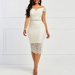 A woman in an Elegant Lace Evening Wedding Party Dress—off-the-shoulder, white, bodycon with cap sleeves and sheer lace hem—stands against a white paneled wall.