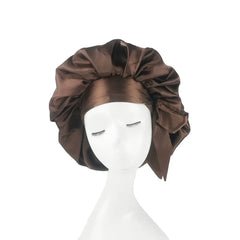 A solid brown satin bonnet with an adjustable wide band on a white mannequin head.