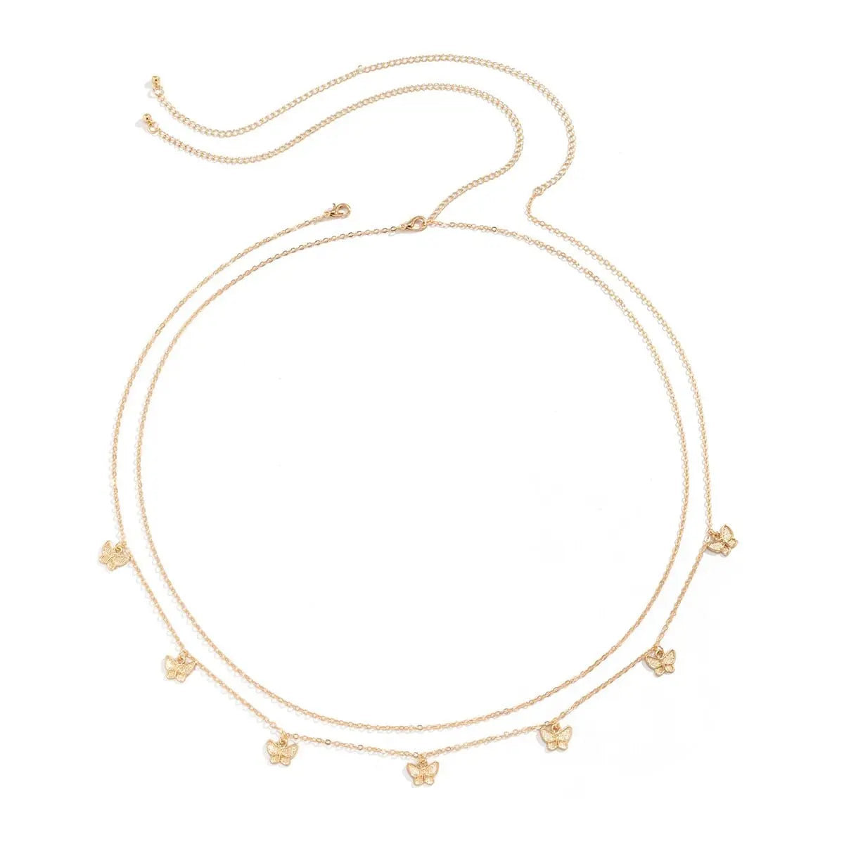 The Fashion Classic Cute Butterfly Waist Chain features two thin gold chains with small butterfly charms, adding a boho touch to your summer vacation style. Perfect as simple, sexy body jewelry for women. Displayed in a circle on a white background.