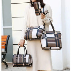 A person in a beige dress holds the Fashion Ladies Bag Handbags Sets 6 in 1 Handbag for Women—featuring matching brown, beige, and black plaid bags—near a building and an orange bench.