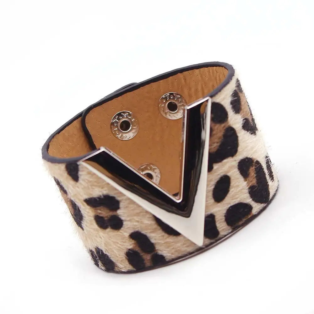 The Fashion Leopard Leather Bracelet For Women is a wide, simple cuff with a bold V accent and snap closures, perfect as an all-match charm wristband for any style.