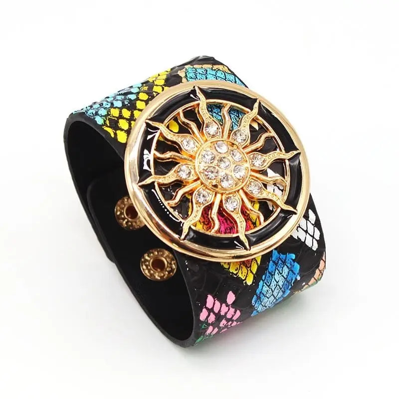 The Fashion Leopard Leather Bracelet for women features a wide cuff design with a vibrant leopard pattern, gold V-shaped charm, rhinestone accents, and secure snap button closure—an eye-catching statement piece for bold style.