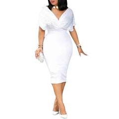 A woman wears a white midi bodycon dress with a V-neck and pearl-embellished ruffled sleeves.