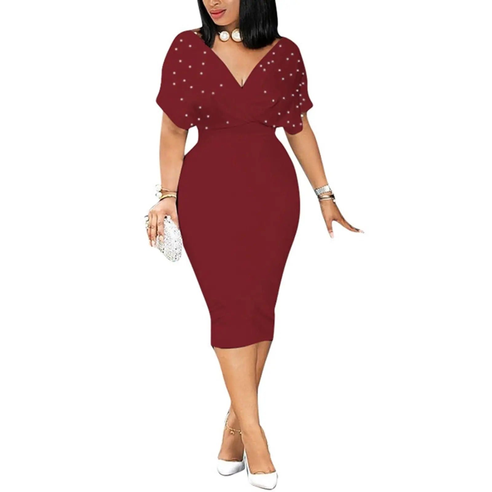 A woman wears a burgundy midi bodycon dress with a V-neck and pearl-embellished short sleeves.