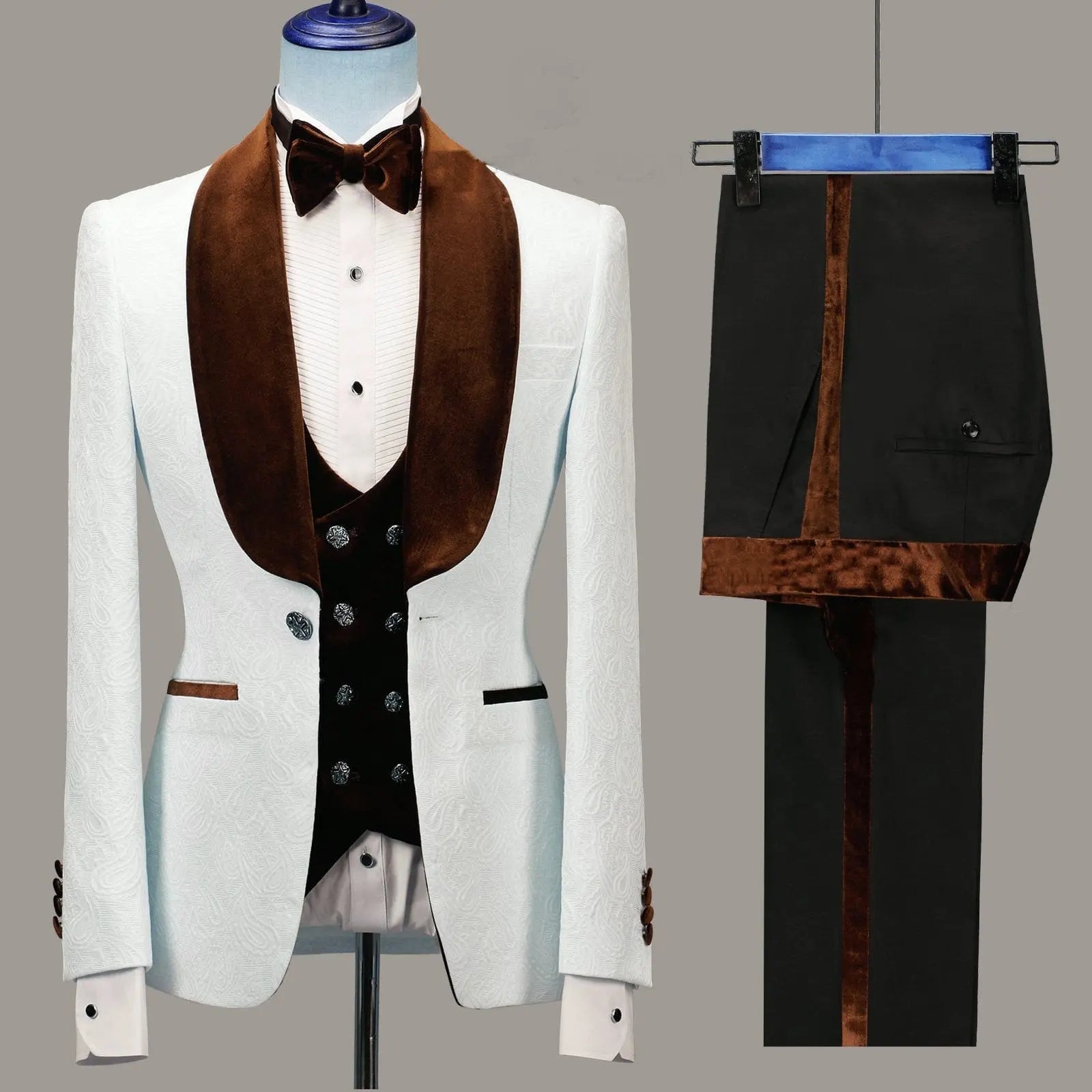A slim fit floral jacket men's suit in navy blue with velvet lapels, ideal as a wedding tuxedo or party blazer for grooms and best men, displayed on a mannequin and hanger.