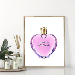A framed canvas print features a stylized illustration of a heart-shaped Vera Wang perfume bottle.