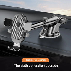 A black car phone holder with an adjustable arm and a suction cup base mounted on a dashboard.