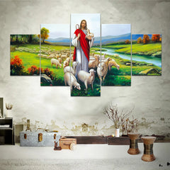 A five-piece canvas wall art set depicting Jesus as a shepherd with a flock of sheep.