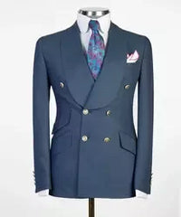 A blue double-breasted men's suit jacket with a notched lapel, patterned tie, and pocket square.