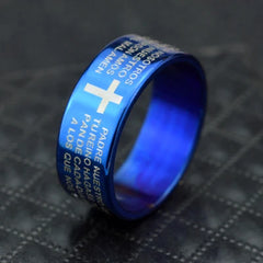 A blue stainless steel ring engraved with Spanish text and a white cross symbol.