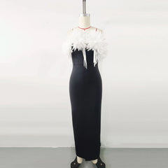 A sleeveless black maxi dress featuring a white 3D floral neckline on a mannequin.