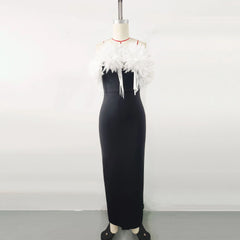 A sleeveless black maxi dress featuring a white 3D floral neckline on a mannequin.