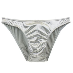 A pair of silver men's bikini briefs made from a smooth, satin-like material.