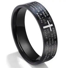 A black titanium steel ring engraved with Spanish prayer text and a central white cross.