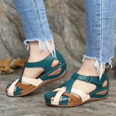 A pair of women's retro wedge sandals featuring a multi-colored patchwork design.