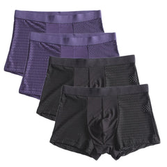 A set of four men's breathable mesh boxer shorts in black and purple.