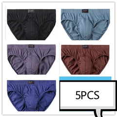 A set of five solid-colored cotton men's briefs in black, blue, grey, brown, and dark blue.