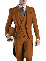 A man wears a slim-fit, three-piece burnt orange tuxedo with a peaked lapel and long tailcoat.