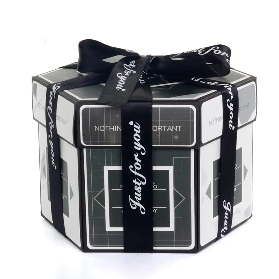 The Hexagon Explosion Box Scrapbook Album is a black-and-white hexagonal DIY photo gift, elegantly wrapped with a "Just for you" ribbon and decorated with geometric patterns—perfect as a unique handmade scrapbook album.