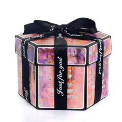 The Hexagon Explosion Box Scrapbook Album features a pink, orange, and purple floral design with black ribbon reading "Just for you" plus the words "Love" and "I love you forever"—a perfect photo album gift.