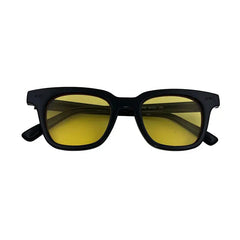 Retro-style square sunglasses with black frames and yellow tinted lenses.