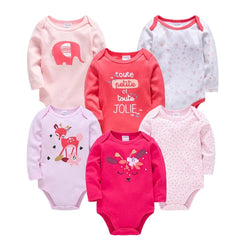 A set of six long-sleeved cotton baby bodysuits in various pink and white colors with cartoon prints.