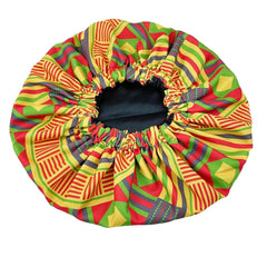 The New African Ankara Pattern Satin Lined Bonnet features a vibrant geometric design, black inner lining, and elastic opening, perfect as a multifunctional women’s beanie or headwrap with double layer protection for adult hair.