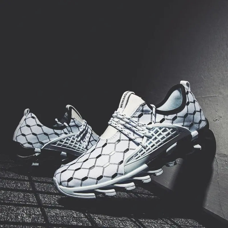 The New Fashion Men Running Shoes feature a modern mesh design with a white base and black geometric hexagon pattern, displayed on a textured surface with dramatic lighting.