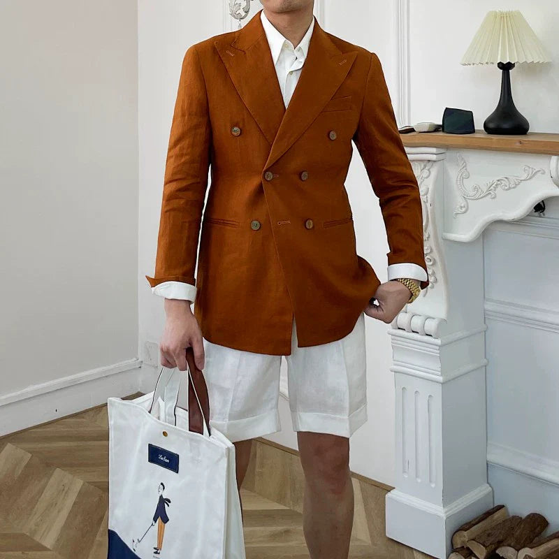 A slim-fit, double-breasted rust-colored linen suit jacket with a notched lapel.