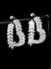 A pair of silver-toned hoop earrings featuring a delicate wheat-leaf pattern set with clear stones.