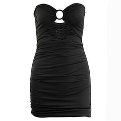 A black strapless mini dress featuring ruched fabric and two circular ring cutouts at the chest.