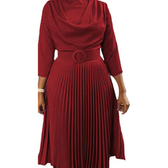 A midi-length red dress with a cowl neckline, three-quarter sleeves, and a pleated skirt.