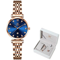 A rose gold OLEVS women's quartz watch with a blue dial and matching jewelry set in a gift box.
