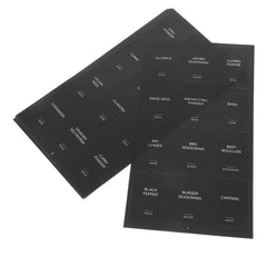 Two sheets of black rectangular spice jar labels with white text for kitchen organization.