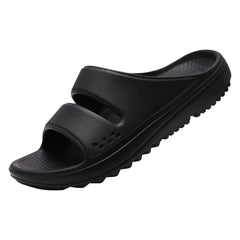 A black, thick-soled EVA slide sandal with a double-strap design and textured footbed.