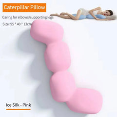 A pink, segmented caterpillar-shaped body pillow made of ice silk fabric.