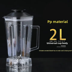 A transparent 2L blender replacement jug with a black lid and an 8-blade serrated assembly.