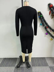 A black long-sleeved midi bodycon dress with a back slit on a mannequin.