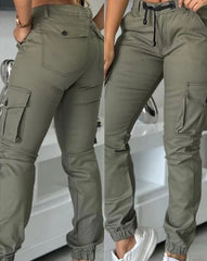 A pair of olive green slim-fit cargo pants featuring multiple pockets, a drawstring waist, and cuffs.