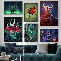 A set of six unframed Hollow Knight canvas prints displayed on a wall above a sofa.