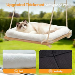 A cat rests on a wooden window perch featuring a soft, white, anti-slip plush cushion.