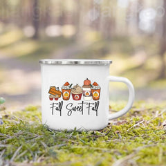 A white enamel mug featuring a Fall Sweet Fall graphic with pumpkin-themed treats and drinks.