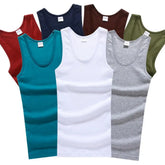 A collection of men's sleeveless cotton tank tops in various solid colors.