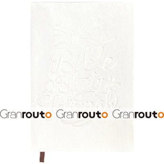 A white Bible study journal with embossed text on the cover and a small ribbon bookmark.