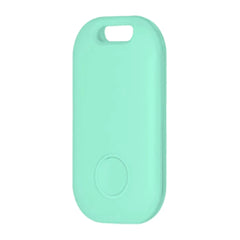 A mint green, oval-shaped Bluetooth GPS tracker with a circular button and a built-in keyhole.
