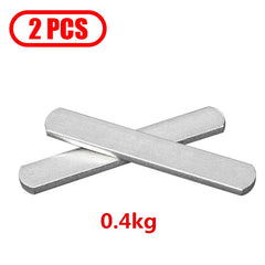 Two rectangular metal weight plates for a fitness training vest.