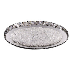 A round, modern LED ceiling light featuring a crystal-encrusted center and a faceted crystal rim.